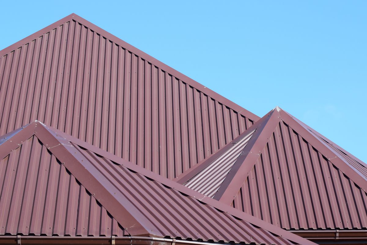 brown metallic roof big house