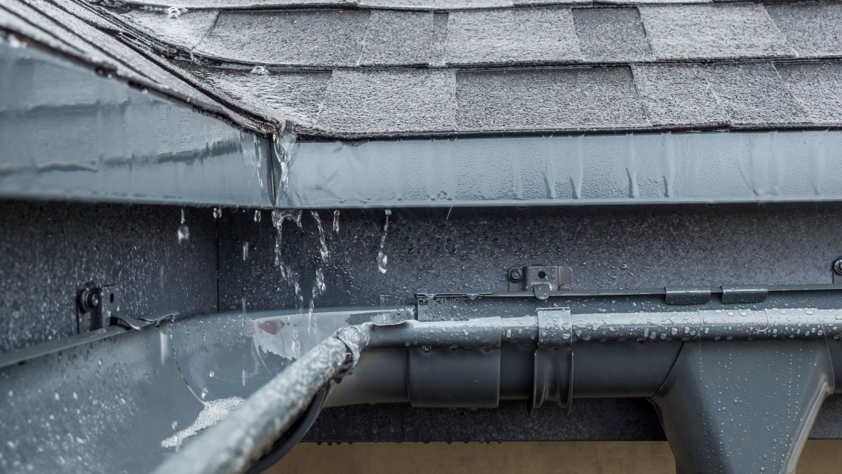 plastic gutters raining close up