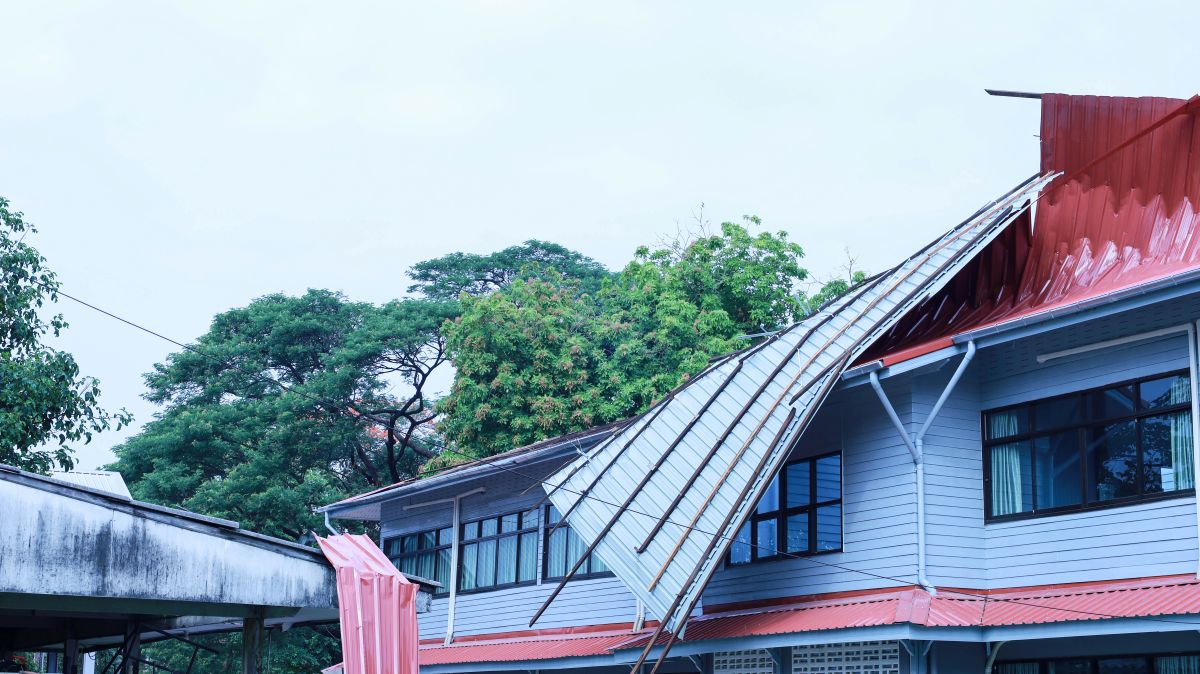 red roof falling after storm