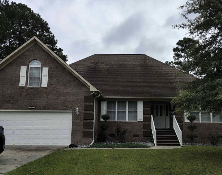 A house with a new shingle roof