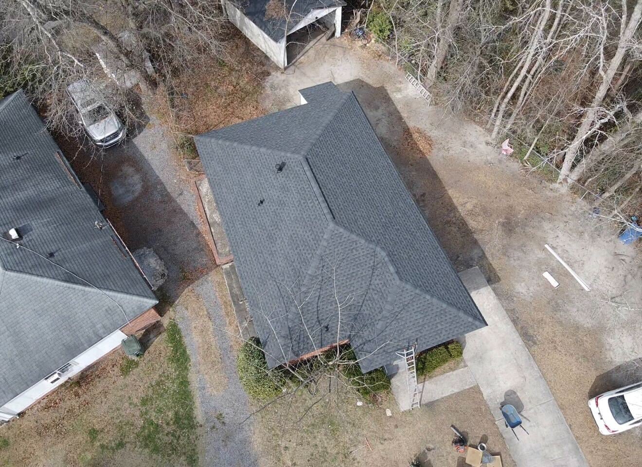 aerial view of a dark grey shingle roof