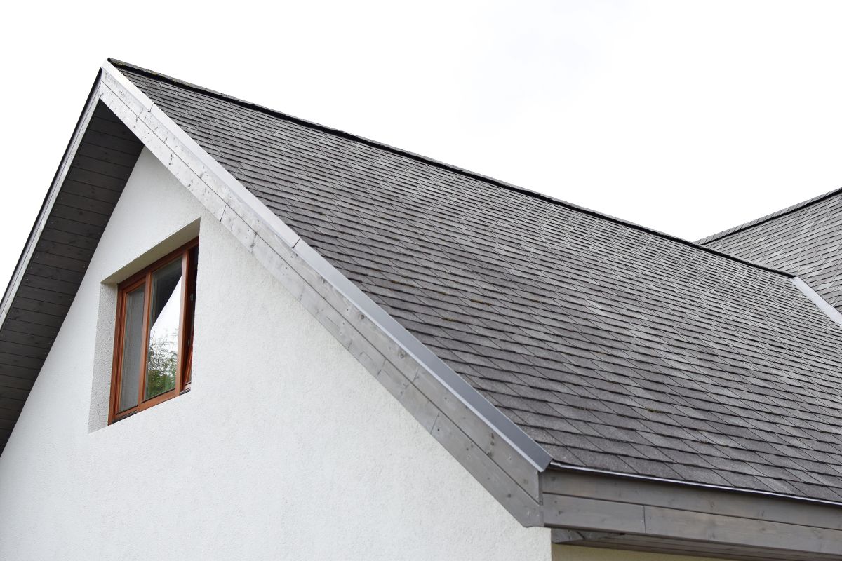 what are eaves dark roof white wall house