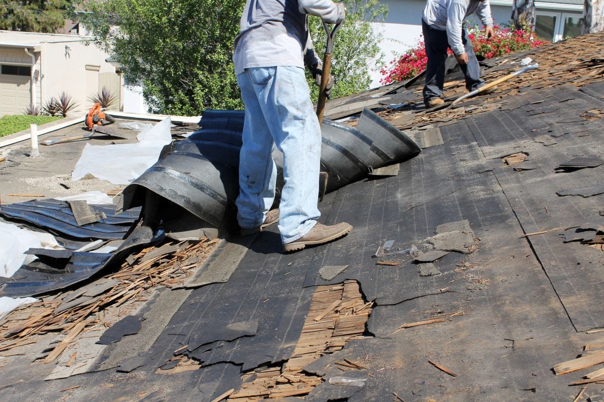 Demolition and removal of an Old Asphalt Single roof
